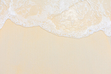Soft ocean wave on clean sandy beach. Summer Holiday background