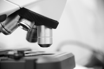 Close up microscope in monotone.
