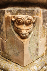 Fototapeta na wymiar Carved face, Batalha Monastery, Monastery of Santa Maria da Vitória, Portugal