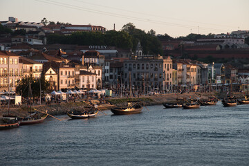 douro's view at sunset.
view of the left quay of douro  (villa nova de gaia) at sunset. portugal, summer. - 416921562