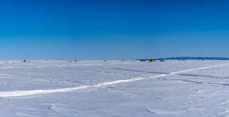 Winter sea covered with ice. Panorama