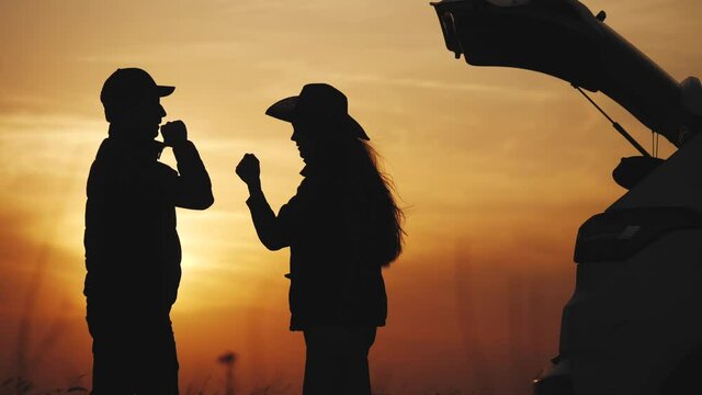 tourists touch elbows social distance. bump avoid greeting. coronavirus pandemic concept. couple of travelers meeting greet each other distance observing a social distance car. bump avoid greeting