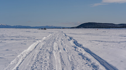 road on the frozen sea made by fishermen