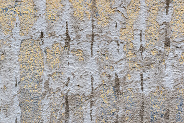 ocher, gray, black surface, speckled peeling