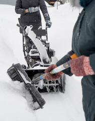 Clearing snow with a snowblower