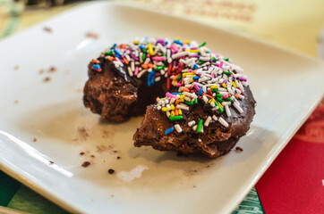 Partially Eaten Sprinkle Donut
