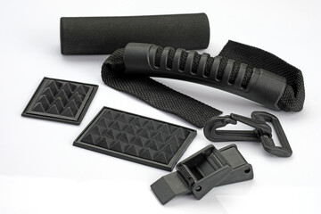 Spare parts for the repair of suitcases. Plastic black fittings for making travel bags. Handle for...