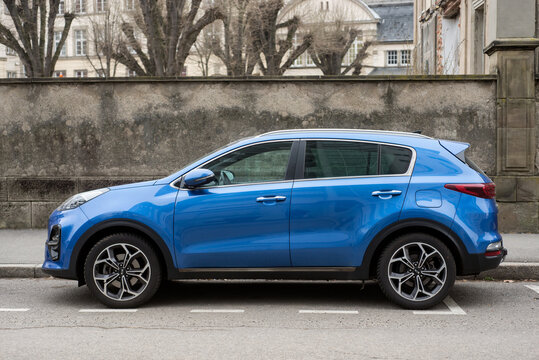 Mulhouse - France - 27 February 2021 - Rear view of blue Kia sportage SUV car parked in the street