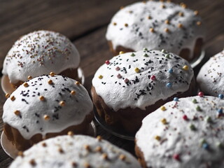 Homemade Easter cakes on a wooden background.