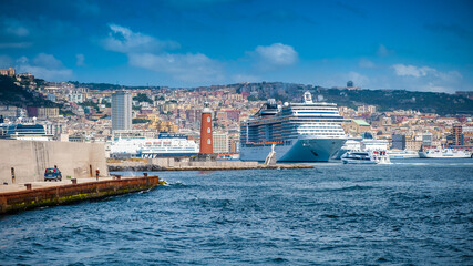 Large ocean cruise ship in the port of Naples, view from the sea