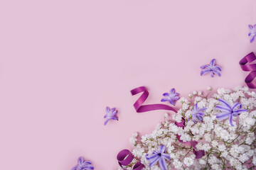 Obraz na płótnie Canvas Floral beautiful pastel pink background. White small flowers. Flowers Gypsophila.