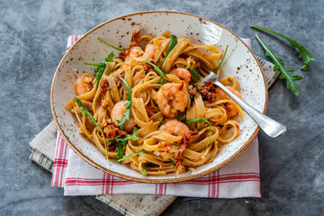 Tiger prawns in tomato, chilli and almond pesto