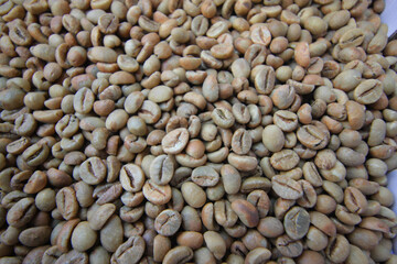 Roasted white coffee beans background