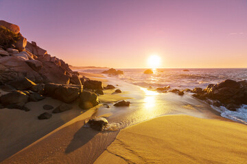 Sandy beach at sunrise
