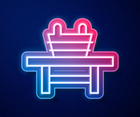 Glowing neon line Sauna bench with bucket icon isolated on blue background. Vector.