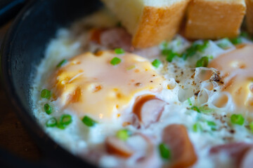 Pan fried egg topping with Thai sausage