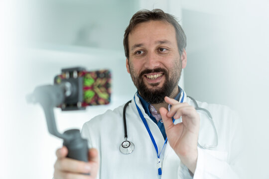 Doctor talking and streaming medical content online ,High quality photo