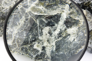 mineral asbestos viewed through a magnifying glass,