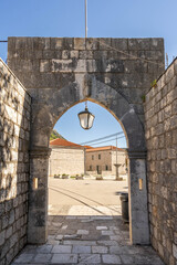Stone gate entrance into Ston city in Ragusa in Croatia summer