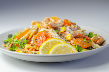Piri piri style chicken on a bed of wholewheat pasta and vegetables, with a cool sour cream and chive dressing
