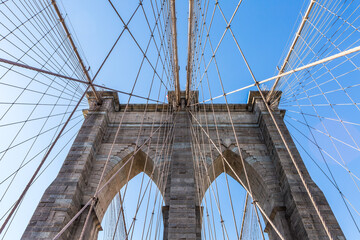 View from the pedestrian walkway of the Brooklyn Bridge. The Brooklyn Bridge is connects the boroughs of Manhattan and Brooklyn and is one of the biggest suspension bridge in the world.