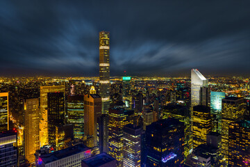 Fototapeta premium Aerial view night panorama of New York City downtown with urban skyscrapers