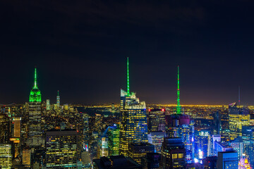 Fototapeta na wymiar Aerial view night panorama of New York City downtown with urban skyscrapers