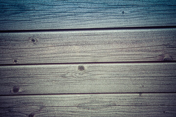 Frost covered wooden planks - a close up of a bench in winter	
