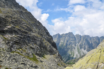 Scenic view of sharp rocky mountains covered with clouds in High Tatras, Slovakia