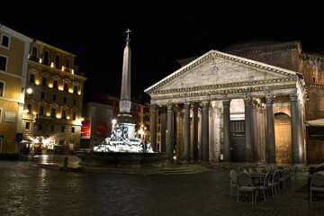 Fototapeta na wymiar Pantheon at night Rome empty square with fountain and lights