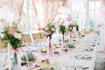 Table setting at a luxury wedding and Beautiful flowers on the table.