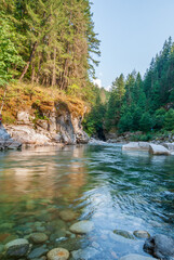 Majestic mountain river with mountain background in Vancouver, Canada.