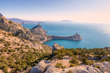 Fototapeta na wymiar The southern coast of New world at pink dawn. Crimea peninsula and Black Sea