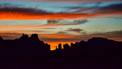 Evening sunset against the backdrop of the mountain landscape, and the red mountains. Canyonlands, Moab, Utah