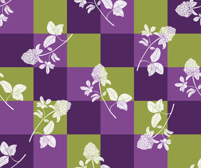 .Silhouettes of clover flowers on a checkered background. Vector seamless pattern. Hand-drawn floral background.