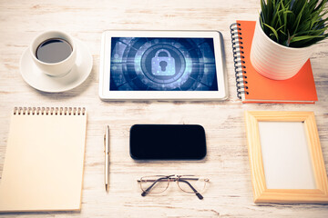 Web security and technology concept with tablet pc on wooden table