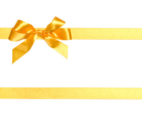 Festive golden gift ribbon and bow isolated on white background cutout