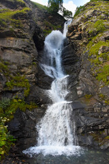 Large and small rivers and waterfalls in North Ossetia against the backdrop of majestic mountains. Republic of North Ossetia - Alania