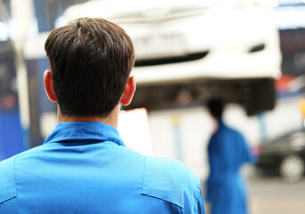 mechanic car control the repair team working at automotive service center technician maintenance...