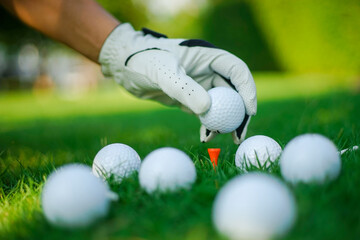 golf ball in hand