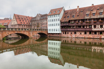 Nuremberg riverside residential district . Arch bridge over Peznitz river in Nuremberg Germany 