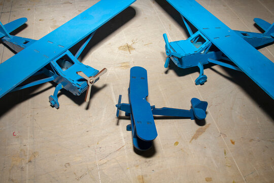 Miniature aircraft models made of plywood and wood, aeromodelling as a hobby.