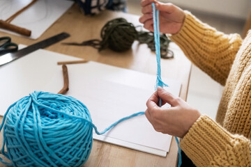 Lesson, the process of creating macrame, weaving from threads. Hand made. A working space for creativity. Knitting knots.