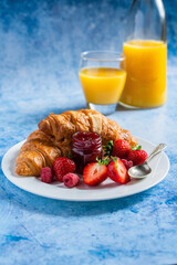 Croissant and orange juice