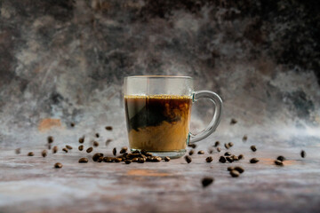 Moody shot of Coffee with Coffee beans