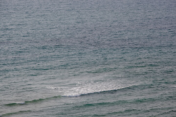Fototapeta premium Waves in the Mediterranean, calm evening sea, minimalism, wave close-up