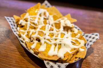 Nacho with sauce served on plate