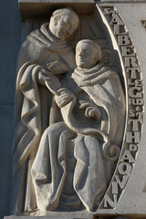 St Thomas d'Aquin & St Albert le Grand sculpture on the facade of Sacred Heart church, Gentilly, France. 22.03.2018