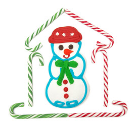 Snowman cookies and candy canes house