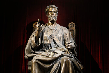 Naklejka premium Saint Pierre de Montrouge church, Paris, France. Sitting Saint Peter statue. 15.01.2018